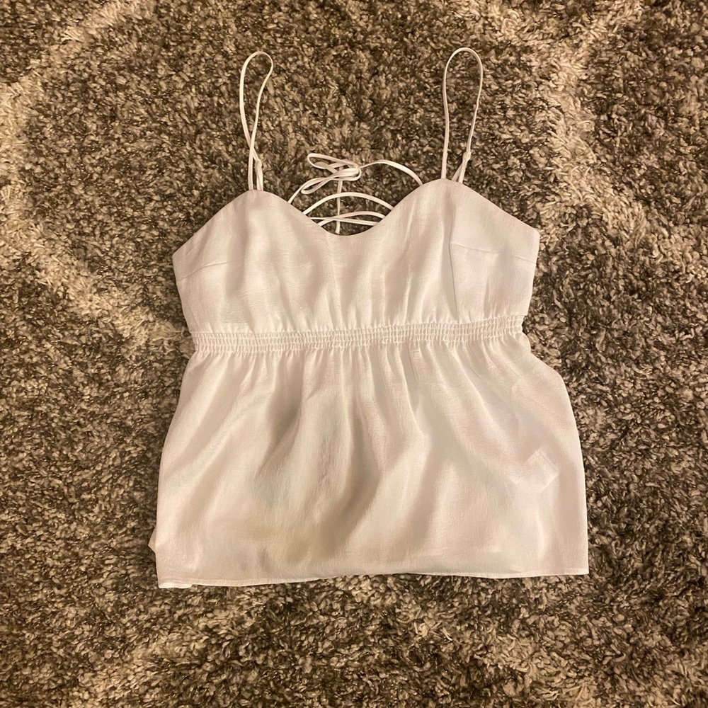 Adjustable peplum spaghetti strap tank top